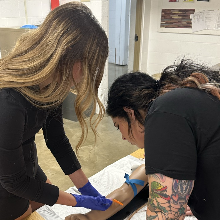 Intro To Health Career students learned about a few of the healthcare programs at Midwest Technical Institute today and got to try their hand at phlebotomy as well as suturing