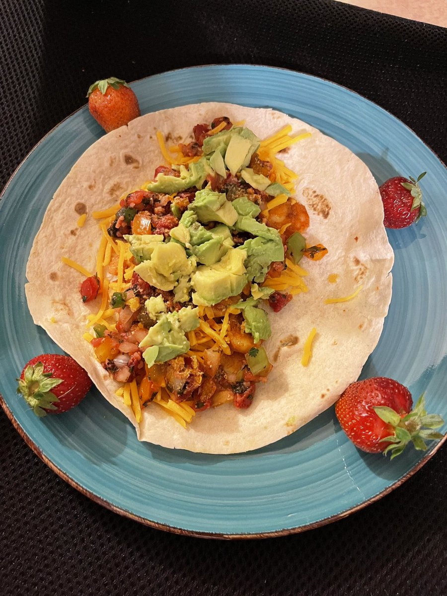 The_Rebsinator's tweet photo. My 3.5 hour art project: Strawberry Chicken and Shrimp Tacos with strawberry salsa, sharp cheddar cheese, and avocados - both are topped with nutritional yeast because that’s the answer to everything… #chefrebs #homechef #helpmeeatmyfood https://t.co/pqYMQ0bj6m