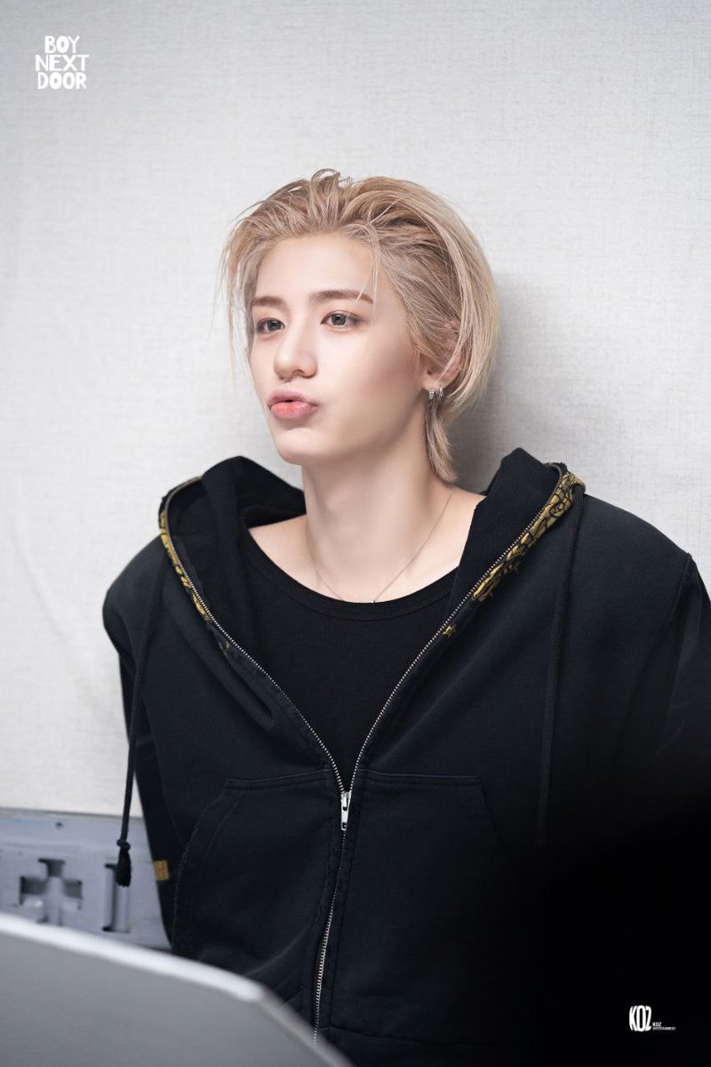 With a hoodie like armor and light in his hair, he dances between boy and legend. Laughing without sound, reaching without rushing—he makes even stillness feel like a scene worth replaying.