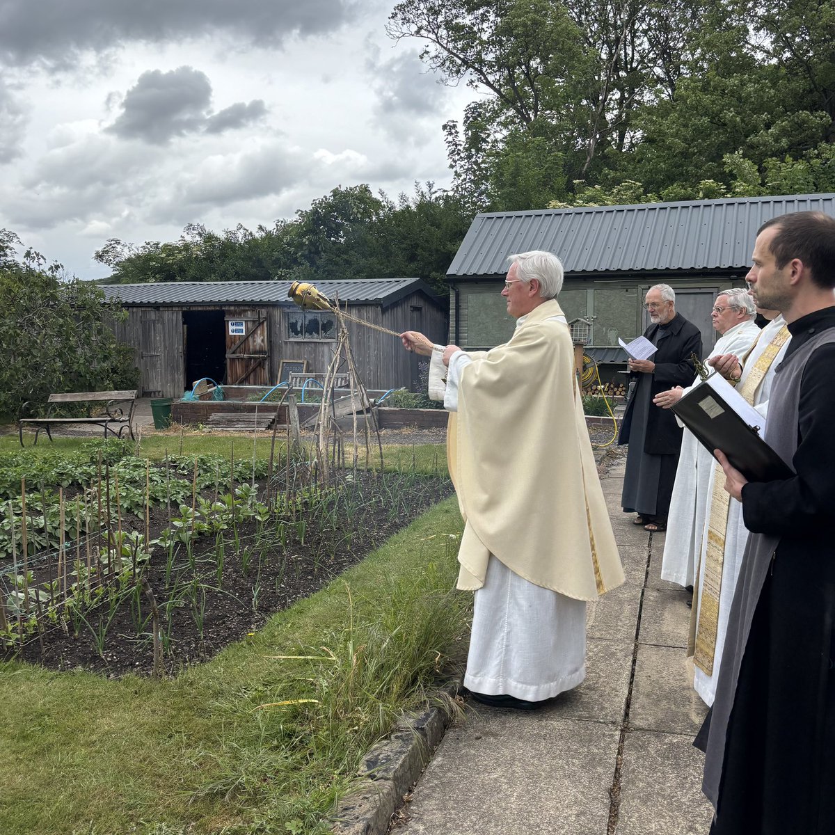 Earlier today some members of the college joined CR for their Rogation Procession, with a litany and blessing of the orchard and the allotments. It’s been raining steadily ever since, but given the recent weather that’s something to give thanks for!