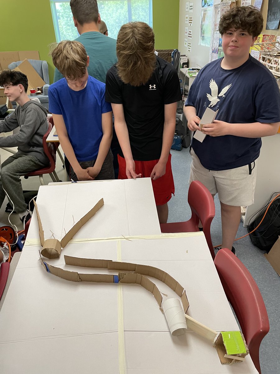 AllSaintsOCSB's tweet photo. Grade 8 students are wrapping up their Rube Goldberg devices to move a ping pong ball from point A to B through a series of simple machines!  #HandsOnLearning #ThisIsASH https://t.co/KFzA50fny3