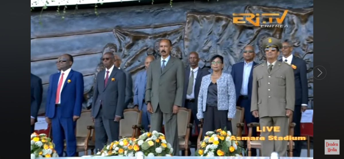 saayEritrea's tweet photo. At the end of Independence Day festivities at Asmara Stadium, they give credit to those who organized the event.  Sadly, this doesn’t include thanking the “Applause Committee”, the “Reading Facial Expression of Isaias Committee” and the “Colorful Attires Committee”, so we will assume it is the Minister of Culture.  

1. Applause Committee:  This is a phrase an #Eritrea|n came up with when we are trying to understand a misplaced applause.  “እታ ናይጣቕዒት ኮሚቴ ኣጋግያቶም" is how he explained it (“The Applause Committee led them astray.”)

Here’s why. 

For the first time since #Ethiopia’s PM @AbiyAhmedAli started his treatise on Water, Sea, and Access in October 2023, the government of Eritrea had not updated its people, officially, as to the status of the Eritrea-Ethiopia Peace & Friendship Agreement of 2018.  And this is the phrase the president used to describe it: ተበጊሱ ነበረ ትስፉው ሃንቀውታ በኒኑ እዩ:: @shabait translated it to “the optimistic prospects that were in the offing have dissipated.”

The audience applauded.  I don’t know why other than they finally got the position of the government and, it turns out, Awel Seied was not improvising all this time. 

2. “Reading Facial Expression of Isaias Committee”

During the Cold War, the U.S. could only read who was ascending and who was descending within the closed circuit USSR leadership based on the seating arrangement of USSR officials during the annual May Day parade.  

This is harder to do in #Eritrea. Was Foreign Minister Osman Saleh absent because he is traveling or sick or sidelined? Has #PFDJ Political Director Yemane Gebreab been defrosted and returned to prominence or he was just substituting for Osman Saleh? Whatever happened to #EPLF legend Sebhat Ephrem? 

Only Isaias knows. 

Whoever is present, their role is to exemplify servility and abjectness by inventing protocols that don’t exist: stand when the President is standing; laugh when he is laughing and to be sour faced when he is.  The committee on reading Isaias did its job well.  

3. Colorful Attires Committee

#PFDJ inherited the “Kebele” (neighborhood co-op) administration from #Ethiopia’s Mengistu and weaponized it into a local administration with enforcement mechanism.  Your son went to exile? It will be reported to the kebele and you will be fined.  There is a guest visiting you? Reported.  There is a national holiday? They will tell the women how to dress, how to braid their hair and if they can’t attend what the corresponding fine is. 

This is so important, a kebele (ንኡስ ዞባ) competition is conducted as to who wore it well (Abashawl Neighborhood of Asmara used to win it every year back when I used to follow this)

What’s new this year is that the Diaspora Eritrean version of nationalism—Eritrean flag displayed in bandana, shawl, tassel, hat, ነጸላ, ጋቢ, መቕነዓት, face paint—has taken over. It’s like watching a political party convention, if run by sports fans.  Every year the clothes get louder and in-your-face.  

This is something the People’s Front would never have tolerated but the People’s Front is dead: long live the People’s Front. Now entirely personified in Isaias Afwerki. 

As to the speech, at this point I have nothing to say about the speech—I see it no different from all previous speeches following the zoom-in methodology of story-telling (The Globe -> #Africa -> Region -> #Eritrea), where every year Isaias makes new promises. But I may have something to say about the political culture that never asks “whatever happened to all the pledges made in the past years” and that’s not an Isaias problem, now, is it?
