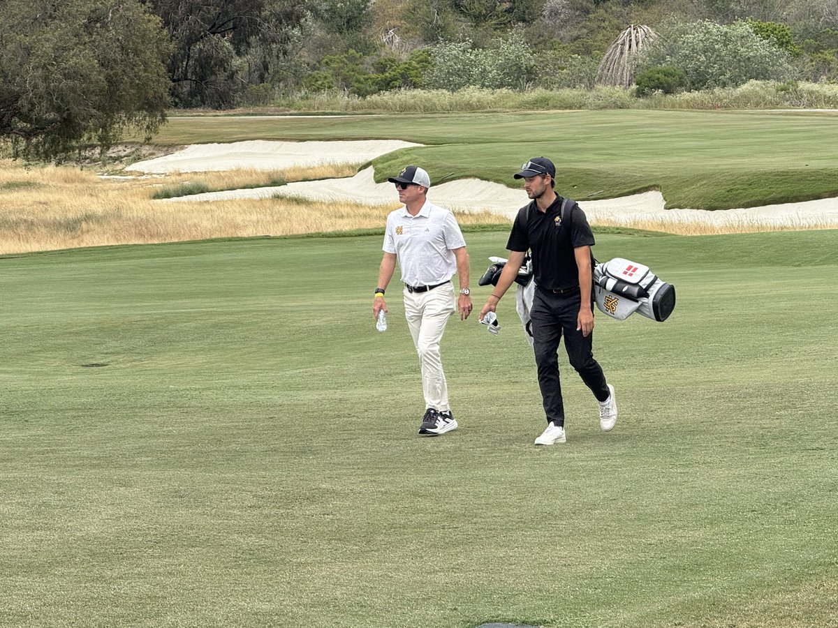 Walking up to 18 green.