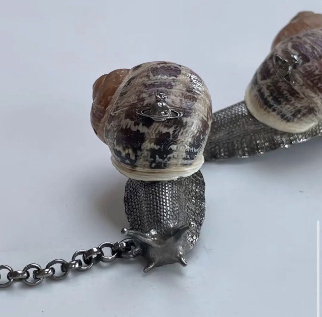 Iithosphere's tweet photo. Vivienne Westwood snail bracelet https://t.co/6ybit9sZ1g