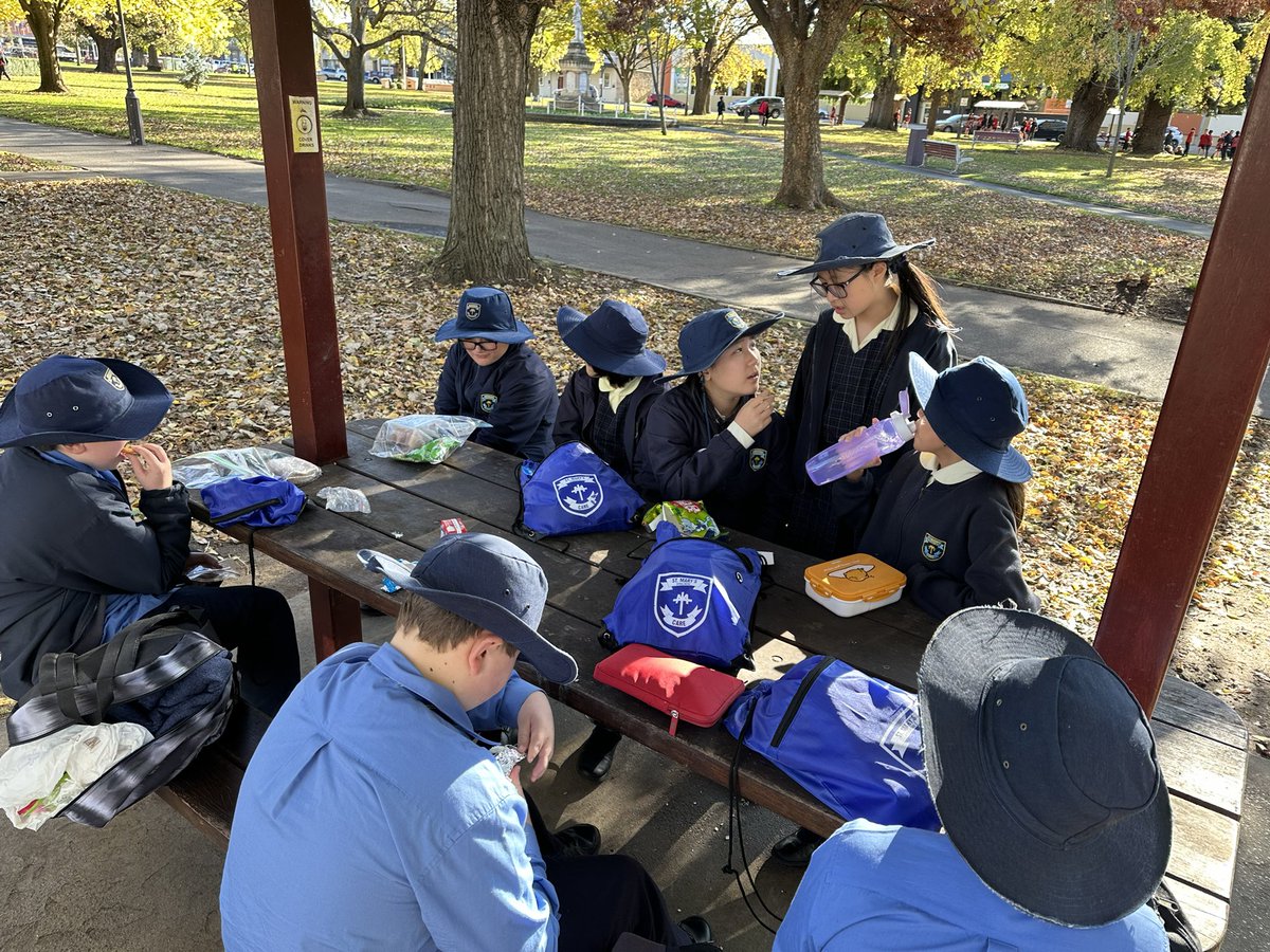 Year Six on their way to Canberra enjoying morning tea.