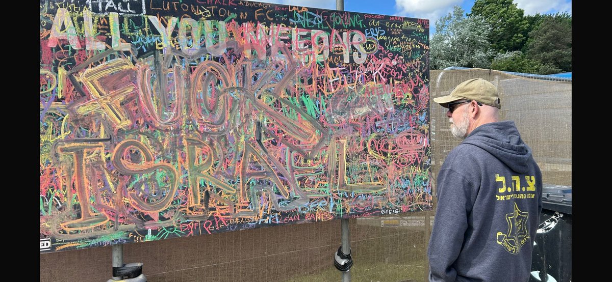 Staring at evil. Someone actually took the time to do this at a festival with so many other things to do. I wasn’t going to let them win so wrote my jumper as statement that we’re not going anywhere. <a href="/beardedtheory/">Bearded Theory</a>
