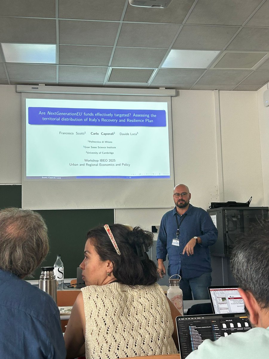Claudio Detotto 🇪🇺 (@claudio_detotto) on Twitter photo We conclude the first part of the regional session with <a href="/CC_caporali/">Carlo Caporali</a> (<a href="/GSSI_LAQUILA/">GranSassoScienceInst</a>): “Are Next Generation EU funds effectively targeted? Assessing the territorial distribution of Italy’s Recovery and Resilience Plan” #IBEO2025 <a href="/umrlisa/">UMR LISA</a> <a href="/crenos_sardegna/">CRENoS</a> We conclude the first part of the regional session with <a href="/CC_caporali/">Carlo Caporali</a> (<a href="/GSSI_LAQUILA/">GranSassoScienceInst</a>): “Are Next Generation EU funds effectively targeted? Assessing the territorial distribution of Italy’s Recovery and Resilience Plan” #IBEO2025 <a href="/umrlisa/">UMR LISA</a> <a href="/crenos_sardegna/">CRENoS</a>