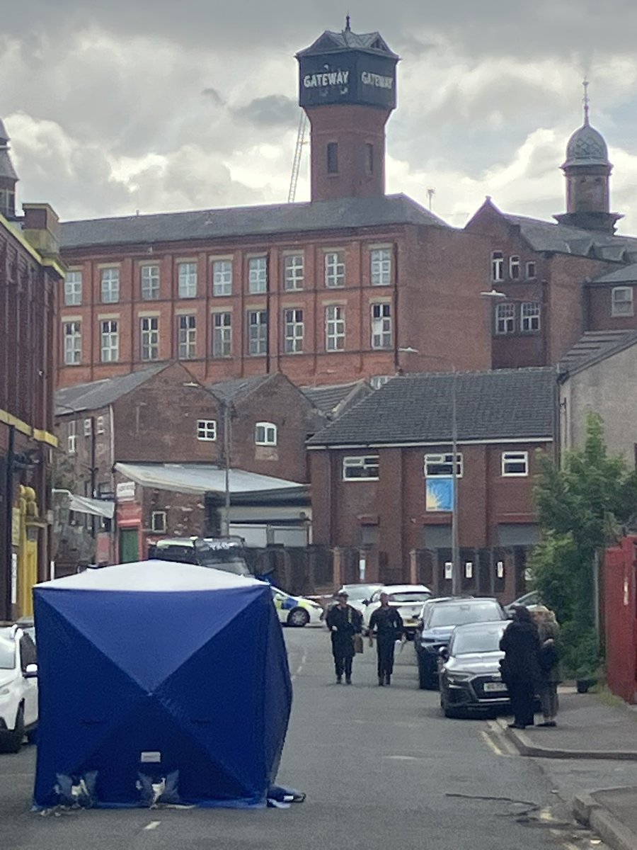 The scene extends round the corner up Cobden Street. <a href="/MENnewsdesk/">Manchester News MEN</a>