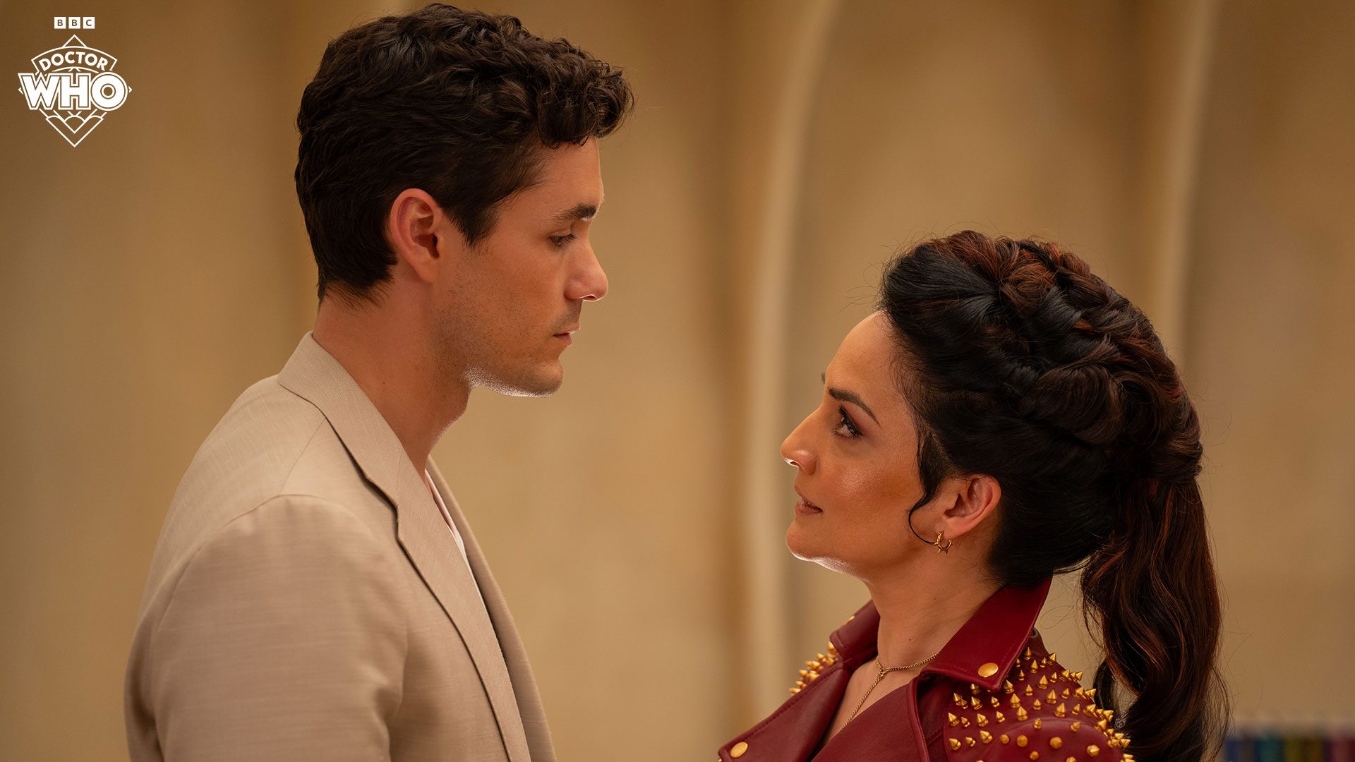 Conrad Clark played by Jonah Hauer-King and the Rani played by Archie Panjabi