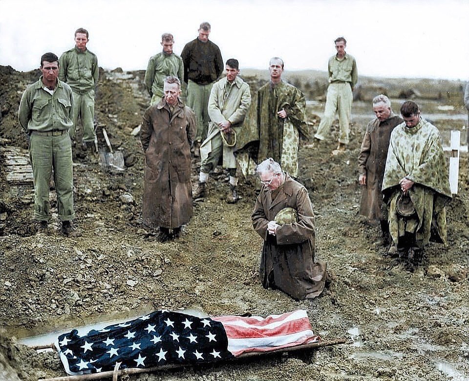 “Those poor souls. They didn’t have their fathers here”
-
Marine Colonel Francis Fenton kneels beside his son, Private First Class Mike Fenton, [B/1/5], near Shuri, Okinawa, May 1945. 
-
They had met once during the fighting when their paths crossed at a partially destroyed