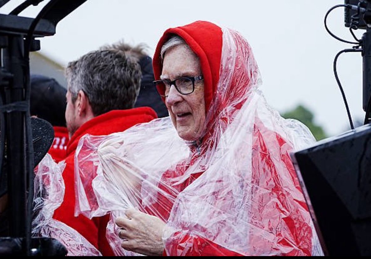 Liverpool owner John Henry attending the parade disguised as a Scouse nan