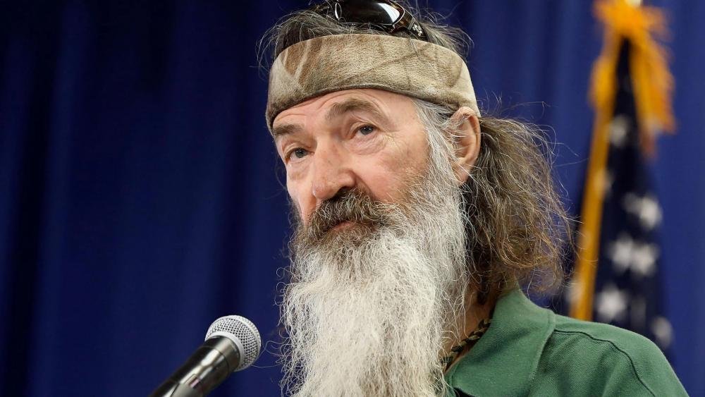 mundocristiano's tweet photo. 🦆 Adiós al patriarca de “Duck Dynasty”
Phil Robertson fallece a los 79 años, dejando un legado de fe, familia y millones de seguidores. 🙏
Su historia sigue resonando.
🔗 https://t.co/mTj7EYJgvj
#PhilRobertson #DuckDynasty #LegadoDeFe #ÚltimaHora
