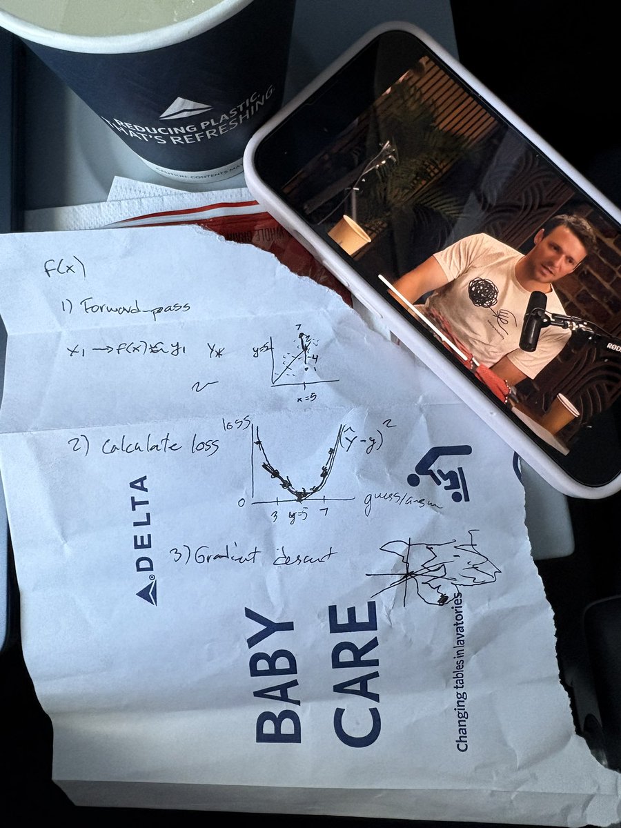 showing my mom how backprop works on the delta barf bag while I show her the new <a href="/dwarkesh_sp/">Dwarkesh Patel</a> episode