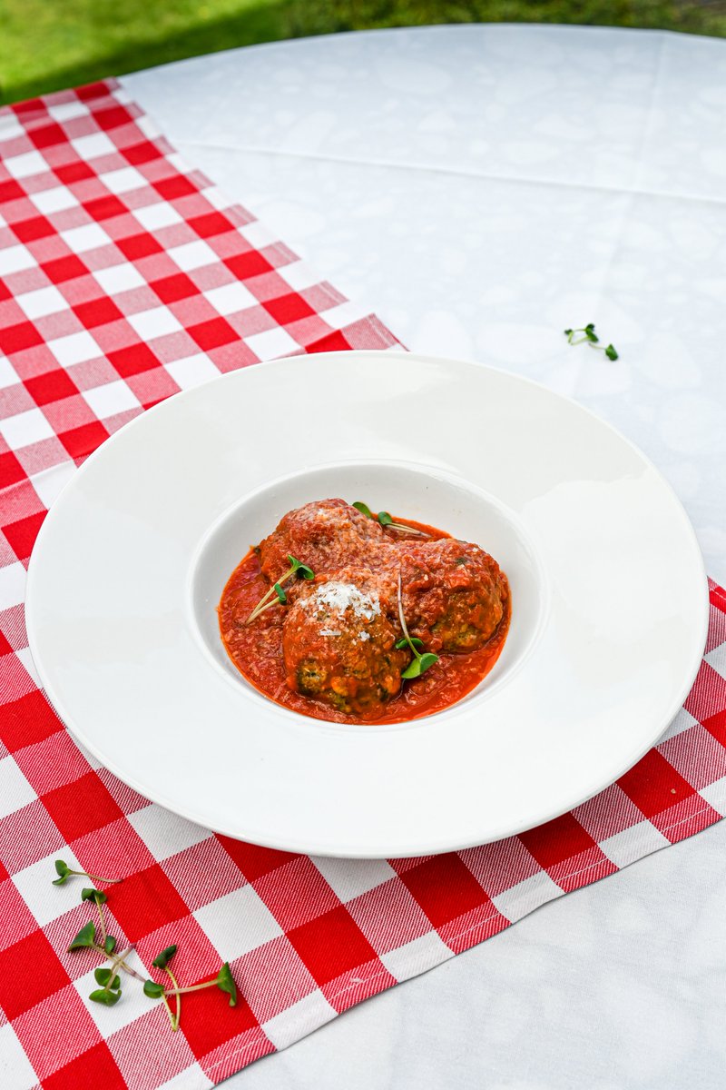 A true classic on our Trattoria menu, our house-made Meatballs are crafted for comfort and flavour. Three tender meatballs simmered in rich marinara sauce, topped with Parmesan, and served with warm focaccia—simple, satisfying, and made from scratch.

Experience this dish—and