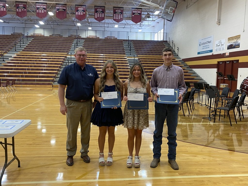 Congratulations to our seniors who were awarded the Shawnee County Farm Bureau scholarships - Taylor Zordel, Makenna Miller and Sheldon Weber, pictured with  Dan Fisher. #SLEagles