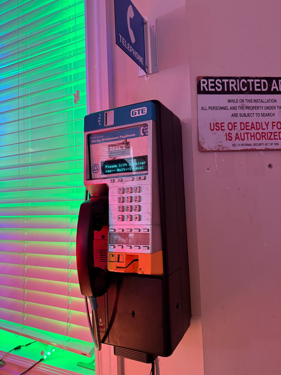 One of my favorite projects in a while!  I found this brand new, never-installed, still in the box payphone.  It's a Nortel Millennium Digital, common in the 90s and 00s.

The first problem is that it needs to connect to the phone company for rates and tables, etc, so I had to