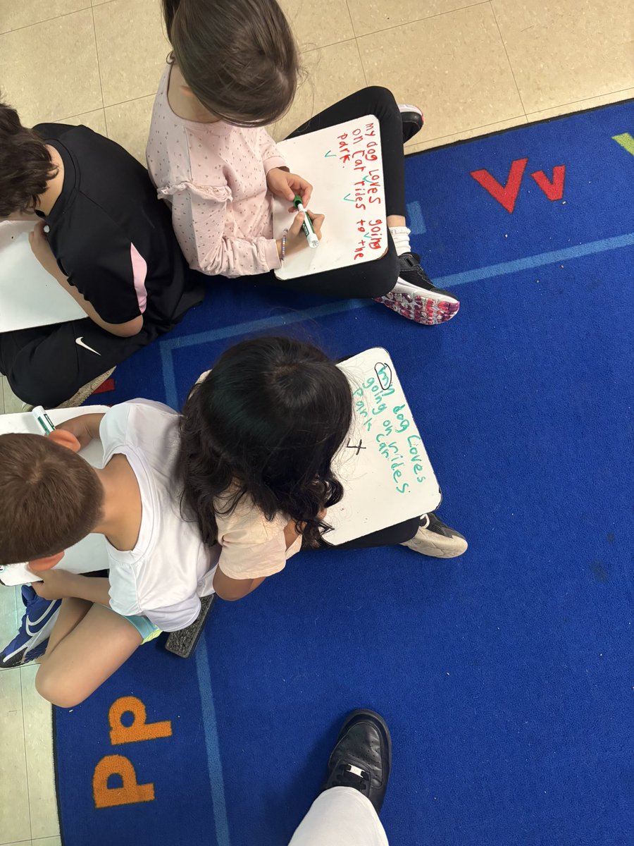 mscortinaa's tweet photo. We’ve been focusing on editing our sentences to build strong paragraphs. A sentence is read aloud, and students use their UFLI strategies to create the sentence. Then students  swap boards and edit each other’s work. We’re becoming confident writers by working together! 📝 https://t.co/s0JliKVP5F