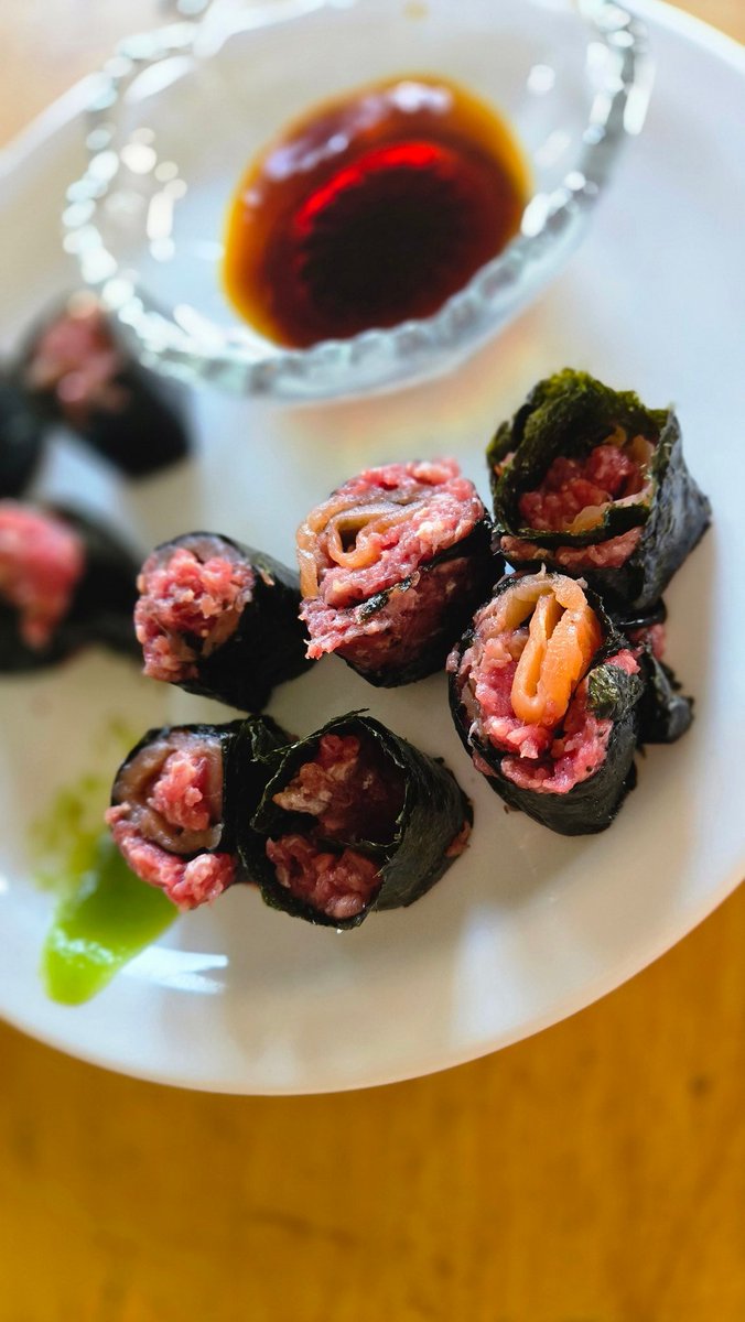 Damn... why didn't I think of this year's ago? #carnivore sushi with steak tartar and smoked salmon. #ABbeef