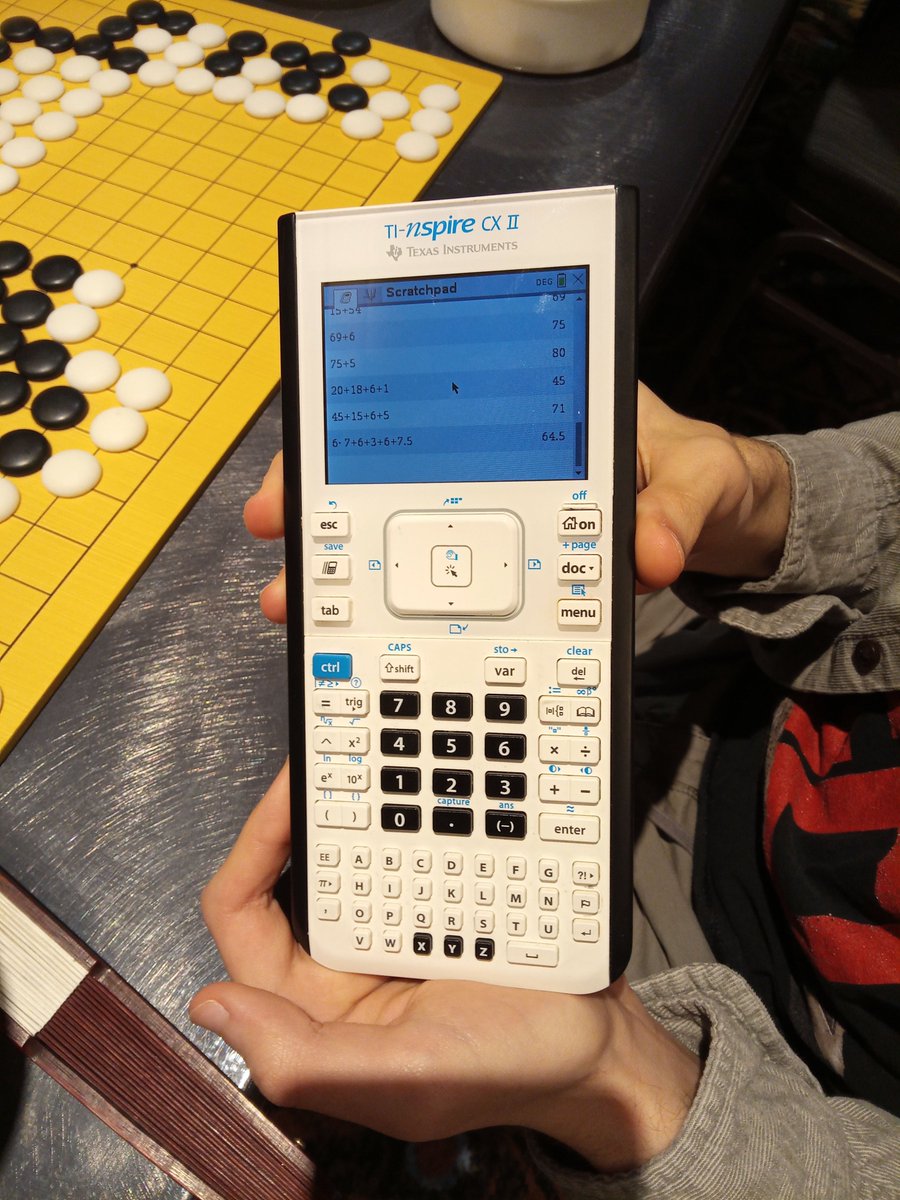 goandmath's tweet image. At Chicago Go tournaments, beginners often use calculators to count territory and captures — and that’s great! Go is an authentic game that gets people using math. After results are confirmed, I show them faster, more intuitive ways to count.