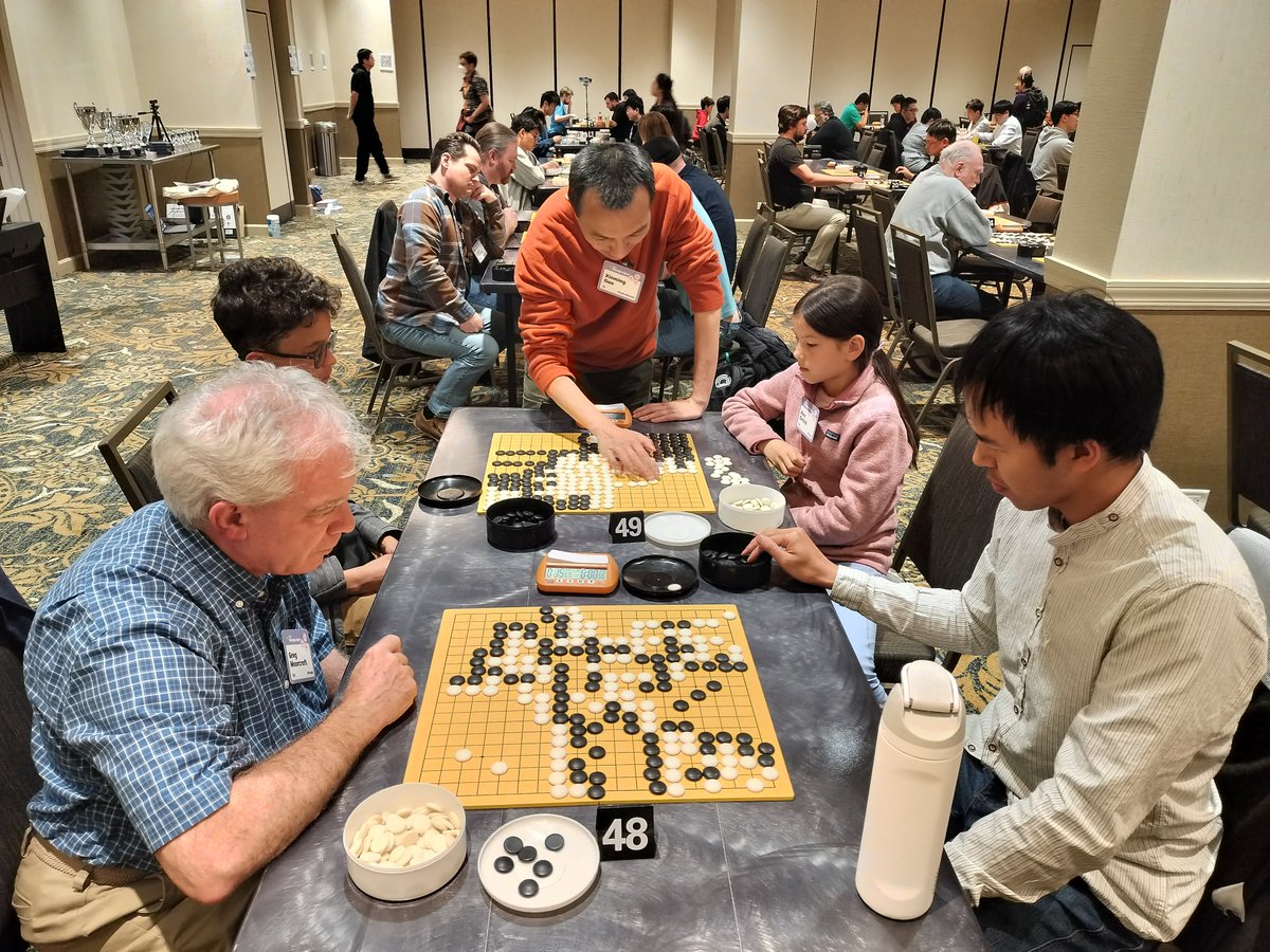 goandmath's tweet image. At Chicago Go tournaments, beginners often use calculators to count territory and captures — and that’s great! Go is an authentic game that gets people using math. After results are confirmed, I show them faster, more intuitive ways to count.