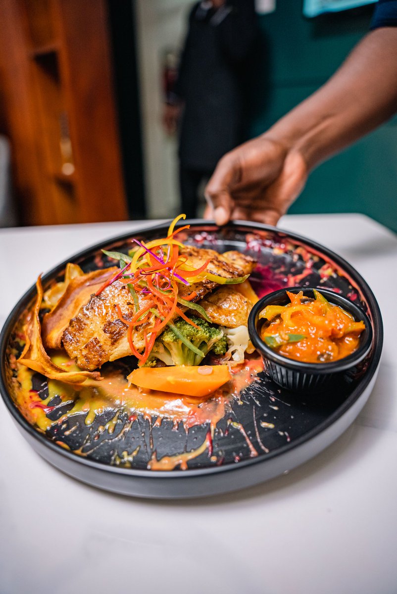 TehilasKla's tweet photo. Grilled to perfection and bursting with color β our signature fish fillet served on a bed of sautΓ©ed vegetables, with a side of zesty tomato relish. A feast for both the eyes and the palate at Tehila's CafΓ© & Grill!
#tehilaskla
#fishfillet
#foodie
#Delicious https://t.co/A0yK525LzS