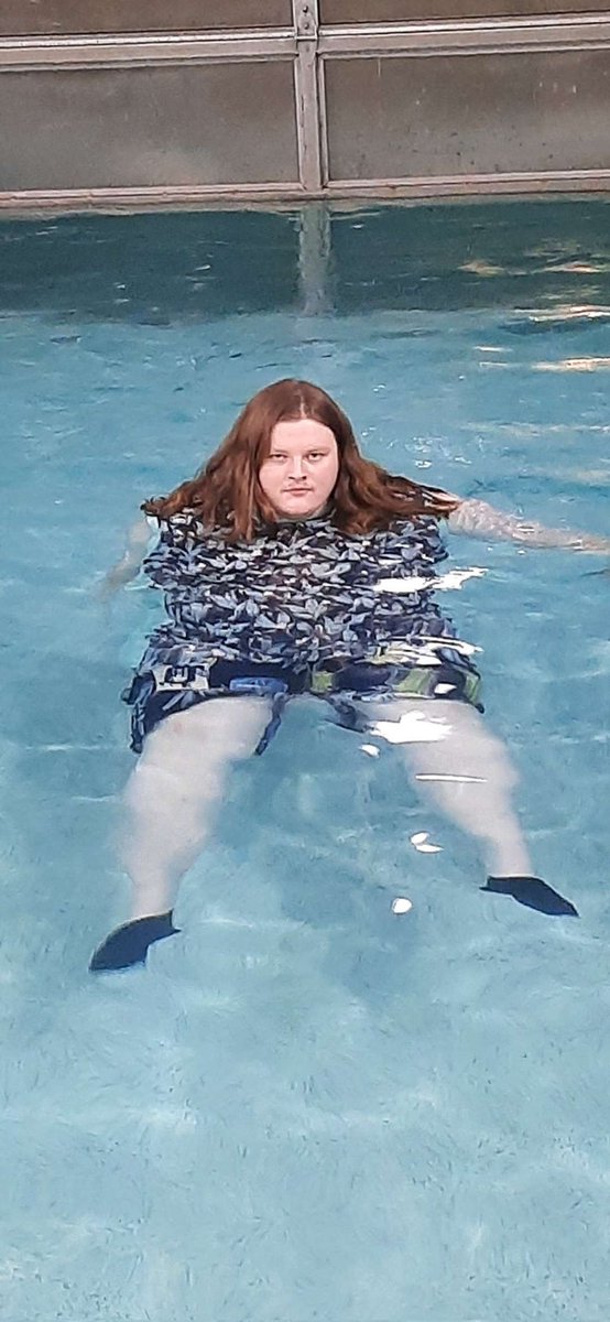 An old photo of me enjoying a pool