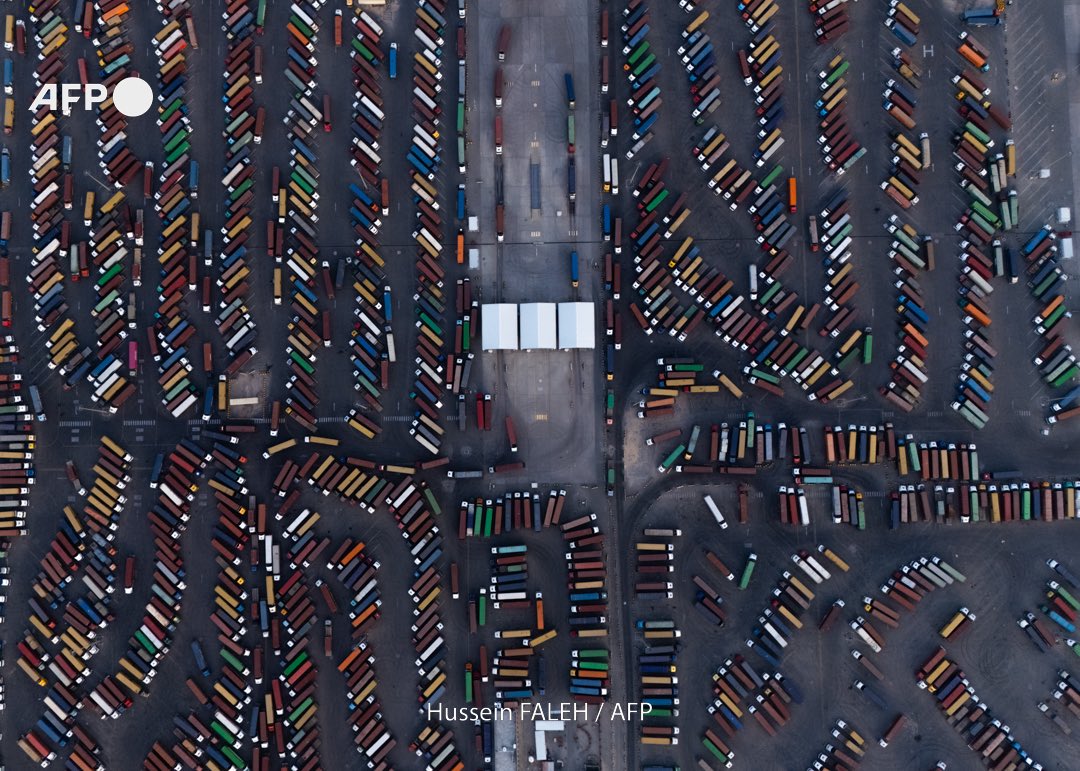 This aerial view shows a container ship cruising at the port of Umm Qasr in Iraq's southern city of Basra on May 26, 2025.
Hussein FALEH / AFP
