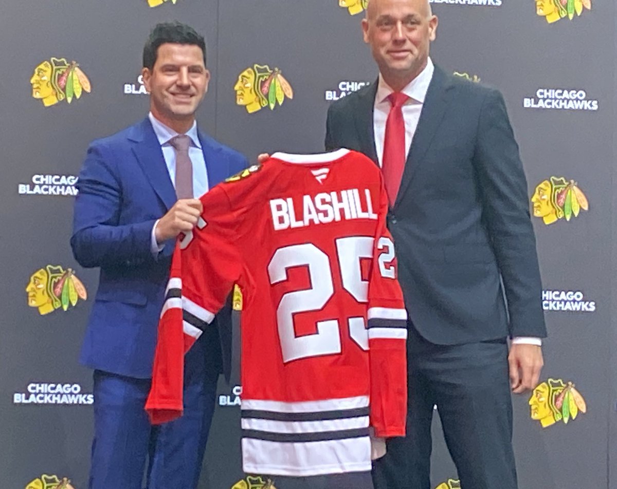Blackhawks GM Kyle Davidson (left) welcomes new head coach Jeff Blashill.