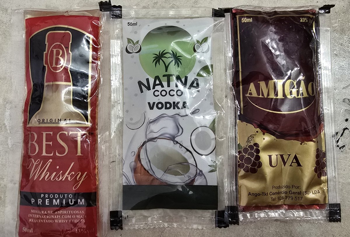 It's illegal to drink while driving in Angola, but okay to use a hand-held mobile phone. 
Some Angolan drivers that appear to be talking on the phone are actually drinking from sachets like these.