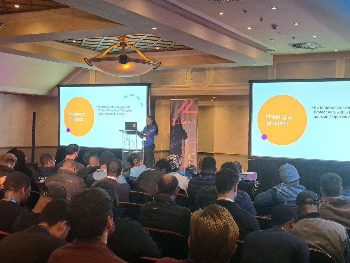 Felicia Sephodi helps us keep things safe by implementing zero trust strategies. #DevConf2025