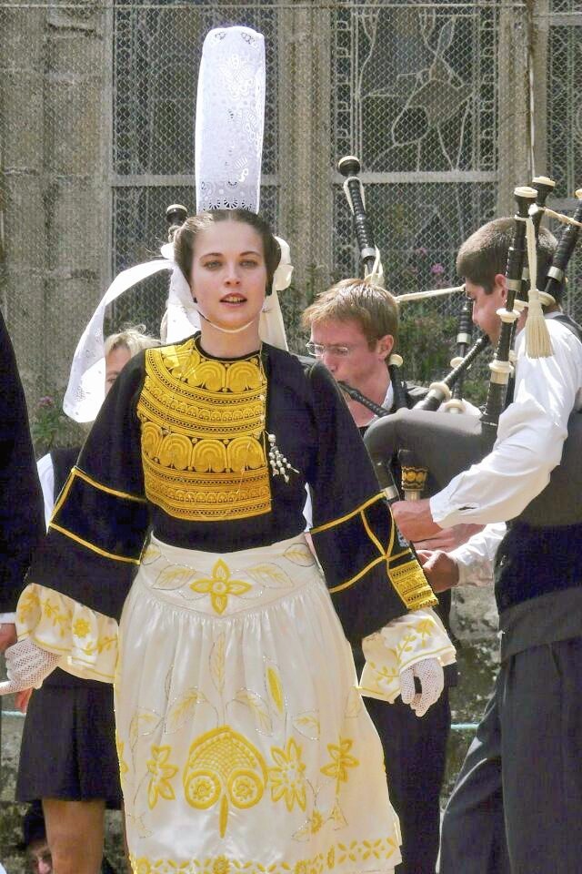 Breton woman in folk clothing.