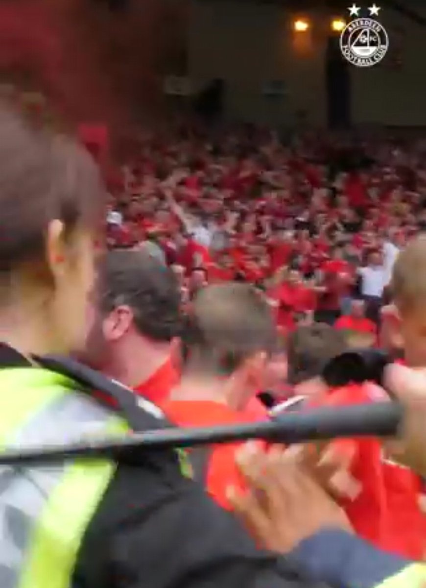 AFCspareTickets's tweet photo. Beautiful scenes. 

But...Police Scotland wielding batons?

Also it was THEM inciting a riot at half time.  

Everyone is against us! 

Up the Dons! 🏆🔴⚪ https://t.co/DwAcyPGRRe