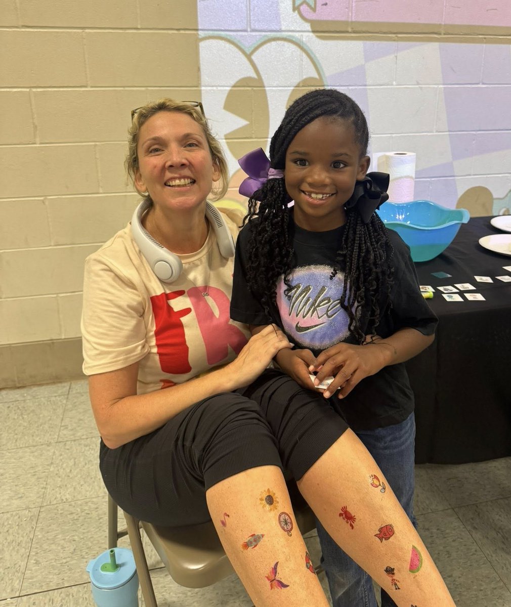 MobilePublicSch's tweet image. Students at George Hall Elementary made their mark on Principal Dr. Tiffany Friday on the last day of school last week, covering her with temporary tattoos. It was a fun way to wrap up the school year! #LearningLeading