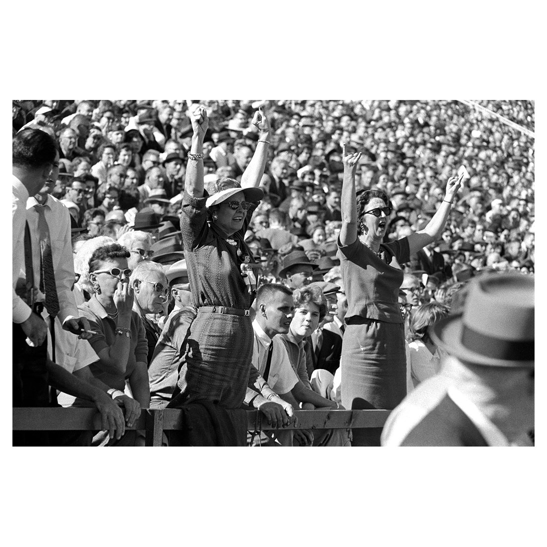 LeiferNeil's tweet photo. A photograph of Texas fans in the stands during a game against Arkansas at Razorback Stadium.

Fayetteville, AR.
October 21, 1961.

#NeilLeifer #Photography #RazorbackStadium #Football #Sports https://t.co/Foo2EgWPYj