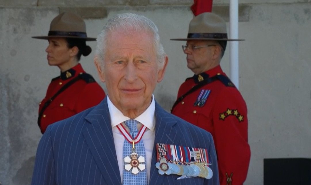 King Charles appears emotional as he arrives at the Senate in Ottawa to open Canada's parliament