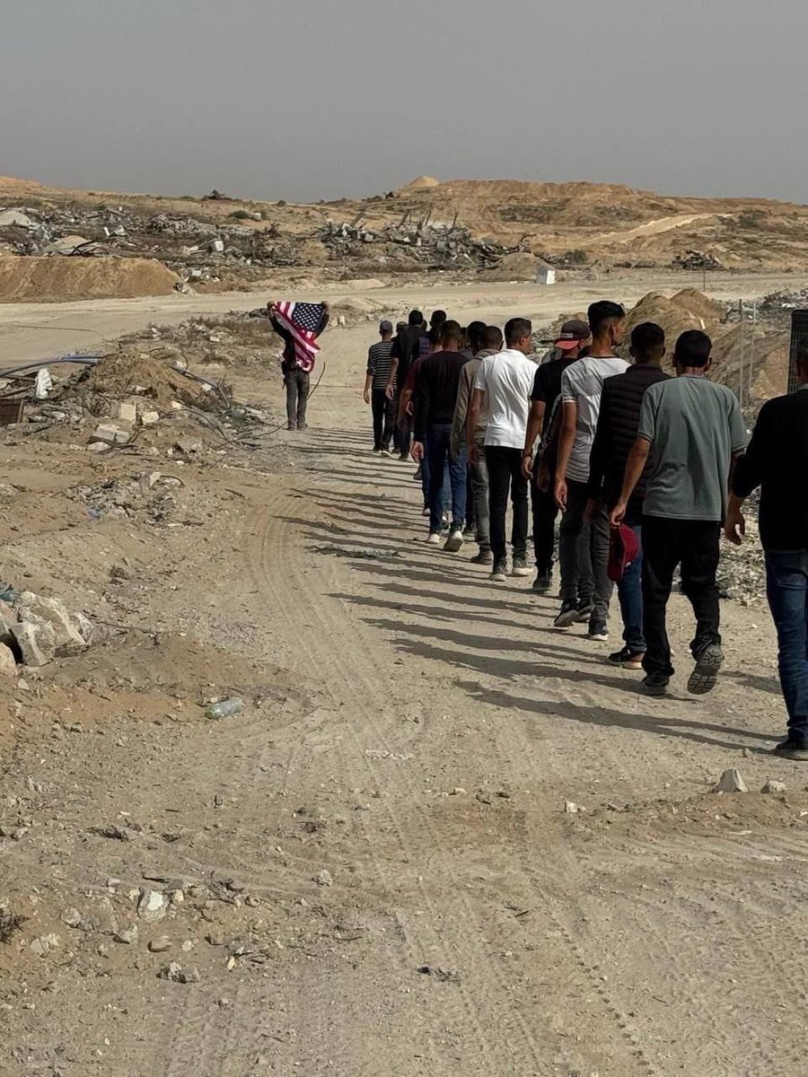 Gazan man seen waving an American flag as he awaits aid in the Strip. Hundreds of civilians trampled over a Hamas checkpoint that tried to block the food distribution and humanitarian aid process. 
Hamas is crumbling