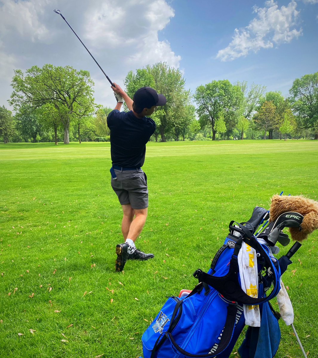 Senior Ryan Hoey-Howell hits his approach shot on No. 15 at Cannon GC