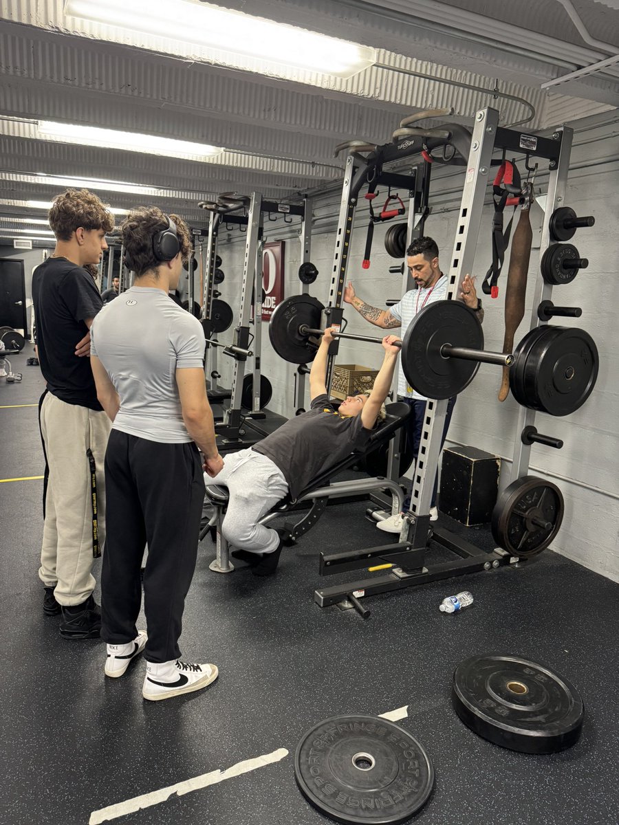 Mr. Sawyer checking in the weight room and helping our students ! <a href="/OssiningSchools/">Ossining UFSD</a>