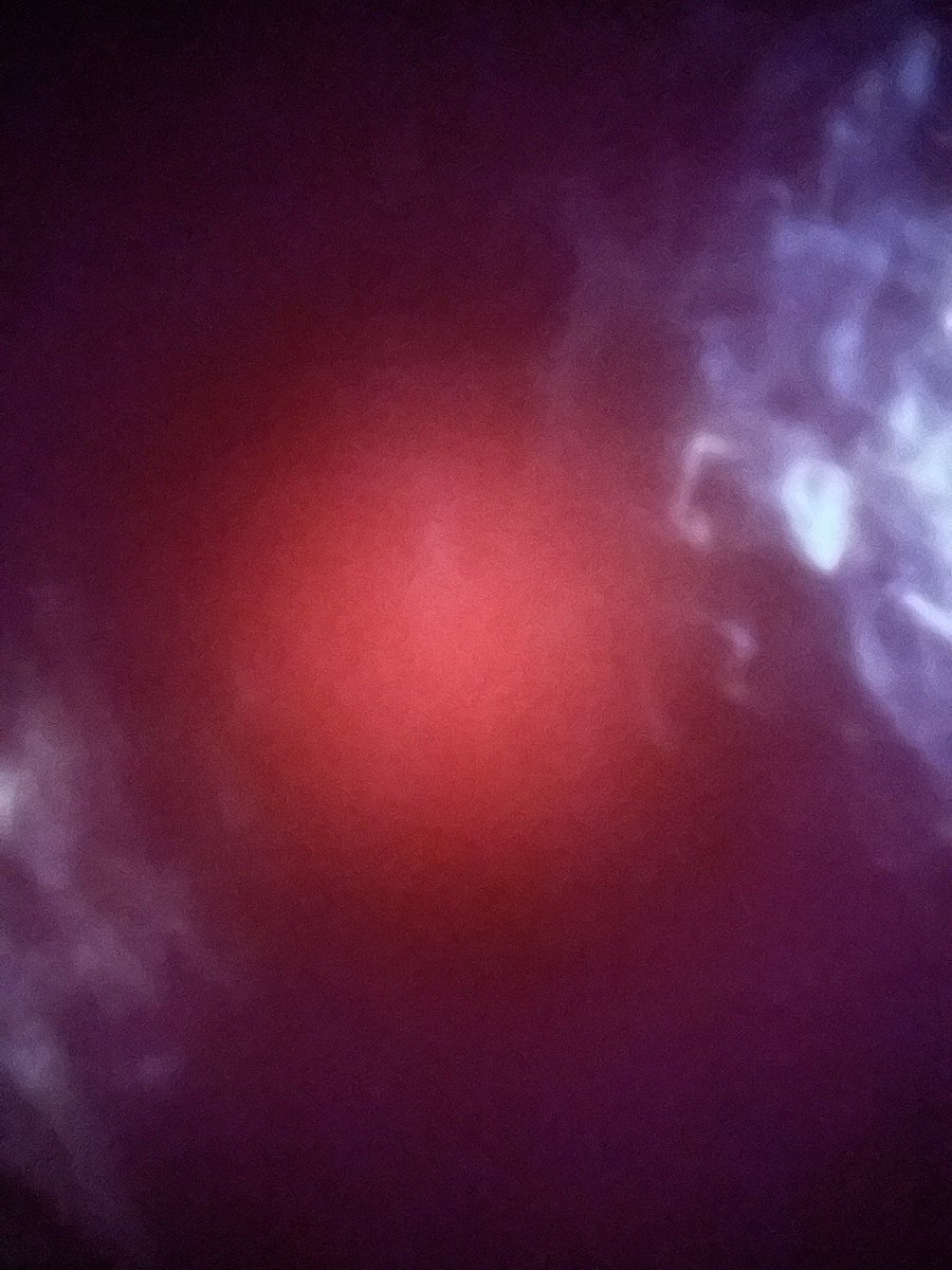 My iPhone accidentally took a picture in my pocket and I wonder what that is. Looks like the birth of the universe or something.