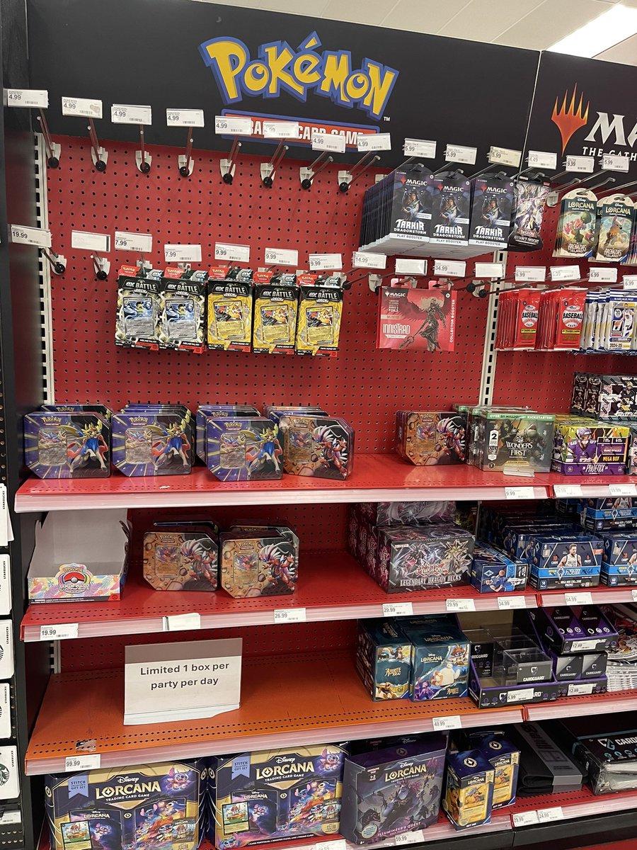 Dyllvn_'s tweet photo. Market place target has a bunch of tins. No one in sight @SquirtleTCGOC @OCptcg @PokeguyOC https://t.co/JGLqSL7cfP