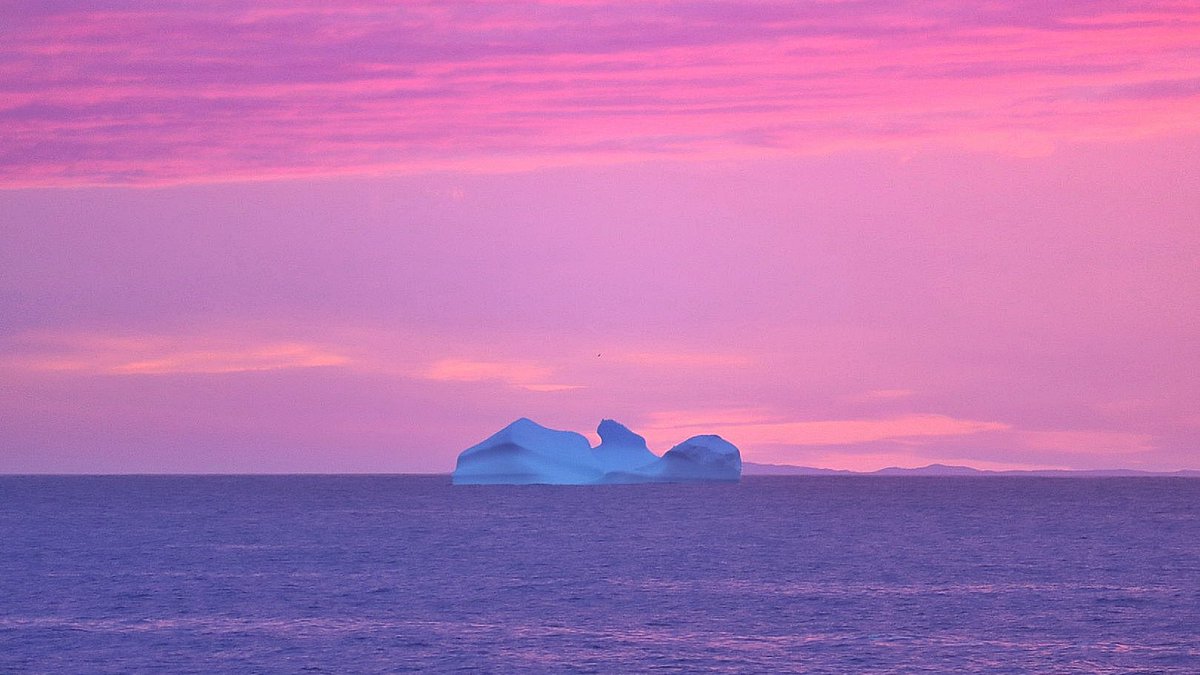 You had to be there tonight to really believe the array of sky colours at sunset here in Bonavista, NL. It was truly amazing!! 🤩 
Interesting shape to the iceberg, eh! 

#ShareYourWeather #Newfoundland
