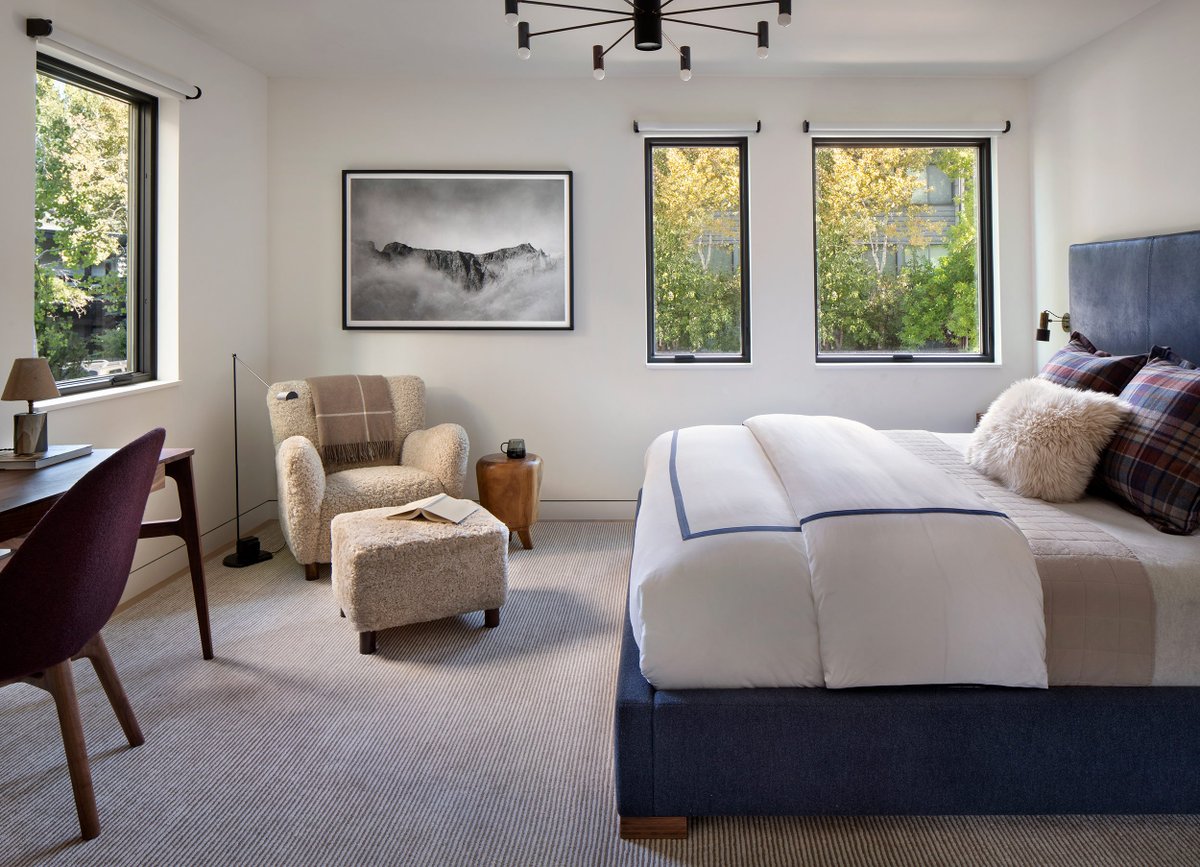 A masterclass in balance: this bedroom by Colorado's Joe McGuire Design blends luxury and livability. Layered bedding, a reading corner, a sculptural desk, and curated art—all thoughtfully composed to restore and inspire.

bit.ly/4acWriS