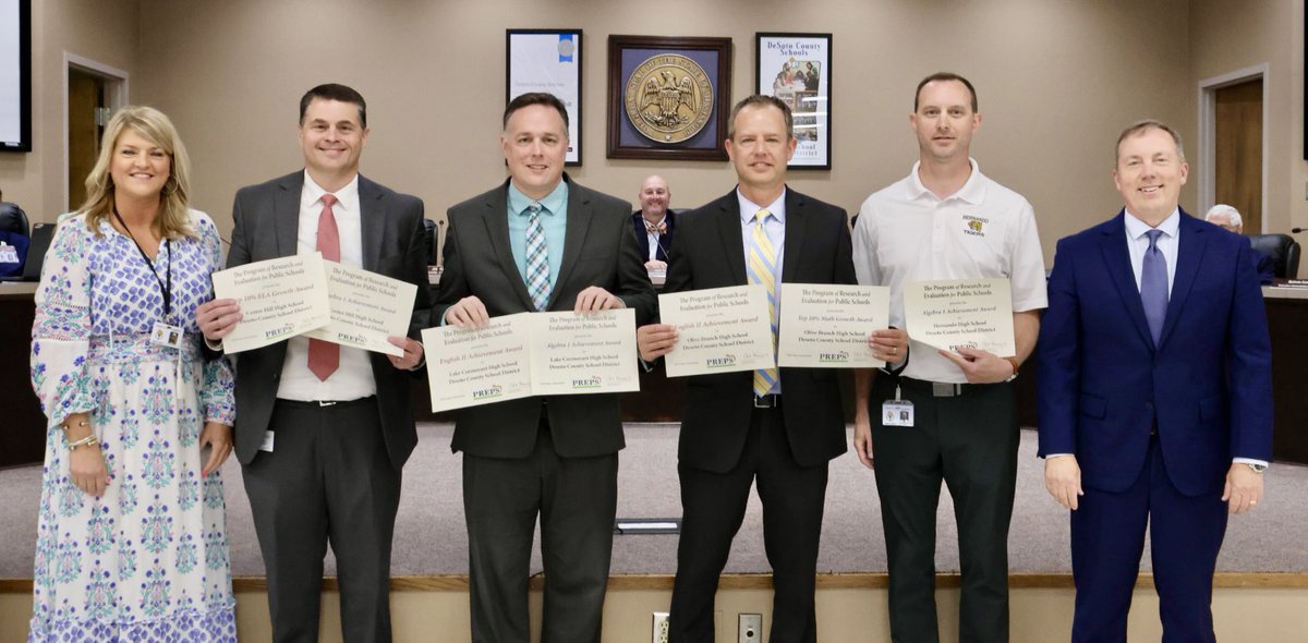 Assistant Supt. Lucy Hasselman &amp; Supt. Cory Uselton join the school board in recognizing the high schools/principals that earned PREPS awards. #TeamDCS #BeTheStandard