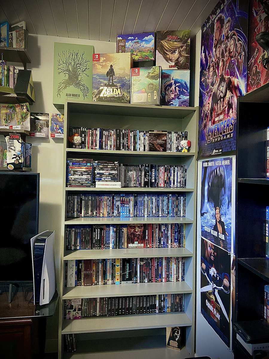 Dmax_117's tweet photo. Finally got my game/movie room set up in my new place. Looking pretty spiffy if I do say so myself! 
#PhysicalMedia 
#PhysicalCollector https://t.co/RKrbPHwABg
