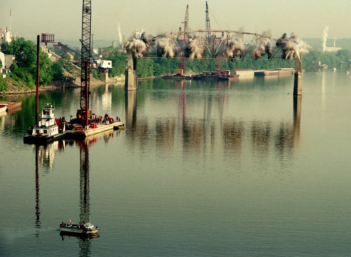 Demolition crews detonated the explosives and the final section of the old Jefferson Street Bridge and starting it drop into the Cumberland River May 10, 1992. 

This was the third and final explosion to remove the whole bridge. 

P. Casey Daley / The <a href="/Tennessean/">Tennessean</a>