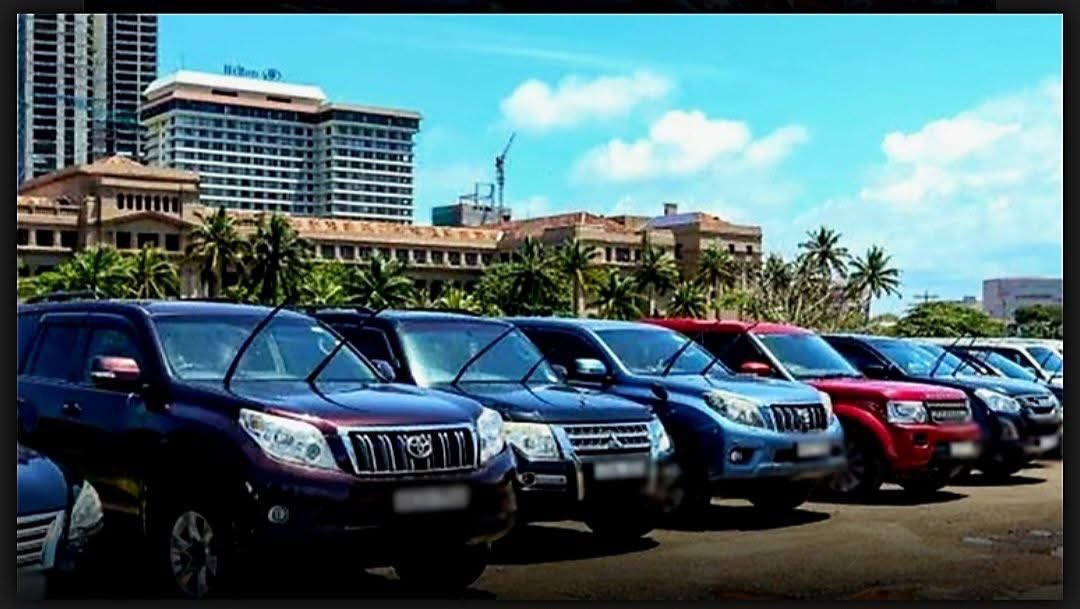 thimiraonline's tweet photo. වාහන වෙන්දේසියක්ද...? හිතමිතුරන් අතර බෙදා දීමක්ද..?

ඊයෙ ජනාධිපති ලේකම් කාර්යාලයේ පැවැති වාහන වෙන්දේසියේද මේ වාහන 26 න් 18 ක් කෝටි 20 කට වෙන්දේසි වෙලා...

මට දන්න කවුරුහරි තියනවාද මේ පාවිච්චි කළ වාහන වල අද වෙළෙඳපොළේ මිල කොහොමද කියලා...

මම දැක්කා මේ වාහනයකට මිලියන 2.5 කටත් මිල නියම වෙලා තිබ්බා..😔

දැන් ත්‍රීවිල් එකකුත් මිලියන 02 යි.. 🙄

පාවිච්චි කළ ඉන්දියානු මරුටි රථයකුත් ලක්ෂ 25 ක් විතර වෙනවා.. 🤔

මේ වාහන වෙන්දේසියක්ද...? වාහන දන්සලක්ද...?

🔻 V 08 රථ 06ක් 
🔻 BMW මෝටර් රථයක්,  
🔻 Ford Everest රථ 02ක්, 
🔻 Hyundai Terracan රථයක්, 
🔻 Land Rover Discovery රථ 02ක්, 
🔻 Mitsubishi Montero රථයක්, 
🔻 Nissan පෙට්‍රල් රථ 03ක්, 
🔻 Nissan වර්ගයේ මෝටර් කාර් 02ක්, 
🔻Porsche Cayenne මෝටර් රථයක්, 
🔻 SsangYong Rexton වර්ගයේ ජීප් රථ 05ක්, 
🔻 Land Cruiser Sahara වර්ගයේ රථයක්, 
🔻Mitsubishi Rosa වර්ගයේ වායු සමීකරණය කළ බස් රථයක්

දැන් පාවිච්චි කරපු V 08 එකක්ම කීයක් විතර වෙනවාද..?
( නිෂ්පාදිත වර්ෂය, වාහනයෙ කන්ඩිෂන් එක අනුව මිල අඩු වැඩි වෙන්න පුළුවන්..)

අනිත් වාහන පැත්තකින් තියන්න දැන් කෝටි 20 ට V 08 තුනක්වත් ගන්න පුළුවන් ද...?

මම වාහන සම්බන්ධයෙන් දන්න ලෝඩ් පකීර් කෙනෙක් නොවුනට මගේ සාමාන්‍ය දැණුම හැටියට නම් මෙතන කෝටි 50 කට වැඩි වටිනාකමින් යුක්ත වාහන තියෙනවා. එක් එක් වාහනය විකුණු මිල ගනන් වෙන වෙනම දක්වන්න පුළුවන් නම් මේ ප්‍රශ්ණය විසඳගන්න පුළුවන්..

එහෙම නැත්නම් මේ විදියට මේ ගනන් වලට වාහනයක් විකුණනවා කියන්නෙත් රජයට අලාභයක් කරනවා කියන එකම තමයි.. ඒකත් දූෂණයක්ම තමයි.. ජනතාවගෙ මුදල් නාස්තියක් තමයි...

මේවා කලින් මොකා පාවිච්චි කරත් මේවා කාගෙවත් පෞද්ගලික වත්කම් නෙවේ. රජයෙ වත්කම්. මේ වාහනවල රාජ්‍ය වත්කම් ශේෂය තීරුවෙ සඳහන්ව ඇති මිල වෙන්දේසි මිලට වඩා අඩුද..? වැඩිද..? 

ආණ්ඩුව හිතනවා ඇති සමහර වාහනTax Free ගෙන්නපු නිසා මේ ගානට දෙන එක ලාබයි කියලා. ඒත් වාහනෙකට වෙළෙඳපොළ මිලක් තියෙනවා..

මේවා ගෙන්නපු එක ජාතික අපරාධයක් නම්...? මෙහෙම කුණුකොල්ලෙට විකුණන එකත් ජාතික අපරාධයක්..

මේවාට සම්බන්ධ නිලධාරීනුත් කන්ටේනර් 323 සිද්ධියට වගේම 2029 පස්සෙ වග උත්තර කියන්න ලෑස්ති වෙලා හිටියොත් හොදයි..

කාට හරි කියන්න පුලුවන් මේවා හරි විනිවිද පේන්න ටෙන්ඩර් දාපුවා කියලා. ඒ කොහොම කරත් මේ වාහනයකට අවම වෙන්දේසි මිලක් තියෙන්න ඕන. එතනින් උඩ තමයි ලංසු තියන්න වෙන්නෙ. 

මේ ගානට අරගෙන යන ගමන් පංචිකාවත්තට කෑලි වලට වික්කත් ලාබයි. චැසි අංකෙයි, එංජින් අංකෙයි එක්ක පොත විතරක් වික්කත් ලාබයි..

නැත්නම් යන ගමන් පොතයි වාහනෙයි උගස් කරත් හොඳ ලාභයක් ගන්න පුළුවන්..

විල්බැරෝ පැදපු එවුන්ට මිලියන 200 මහ ගානක් උනාට උන් මේ මිලියන 200 ට අත්පොඩි ගැහුවාට හරි හමන් වාහනයක් පැදපු එකෙක් තමයි මේවායෙ වටිනාකම දන්නෙ..

Value කරපු එක Value කරලා තියෙන්නෙ නලින් හේවගේගෙ විට්ස් එක ලක්ෂ 12 ට දෙනවා කියපු මිල ගනන් වලටද දන්නෙ නෑ..

නිලන්ත සත්සර ගමගේගේ ලිපියක්