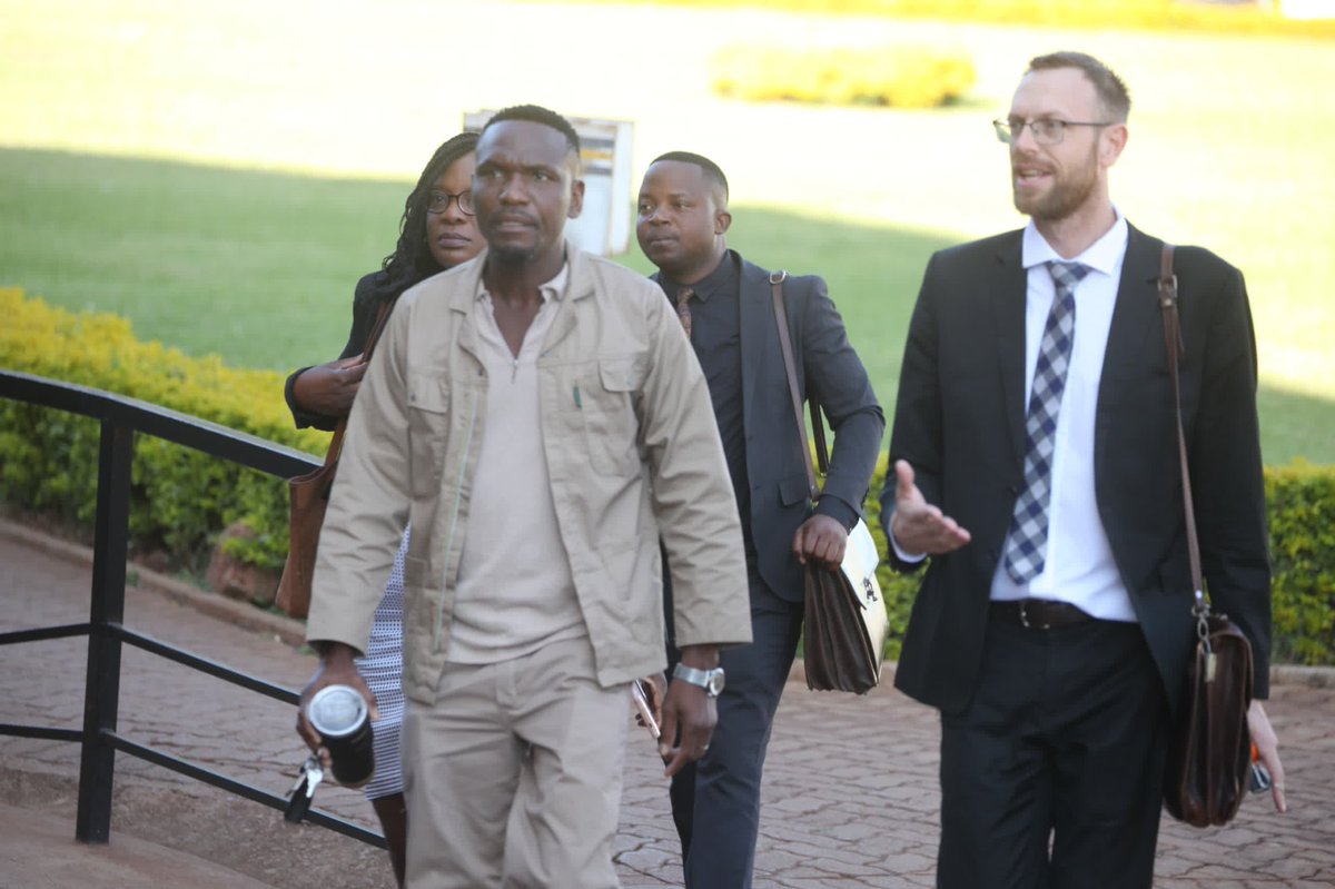 Arrived at court from home with my lawyers. This is after getting bail following 73 days at Harare Remand Prison. We were forced to wear Khakis because we were prisoners. I wore them on my first appearance at court. My lawyer was firmly on my side. Thanks <a href="/DougColtart/">Doug Coltart ✊🏼🇿🇼</a>