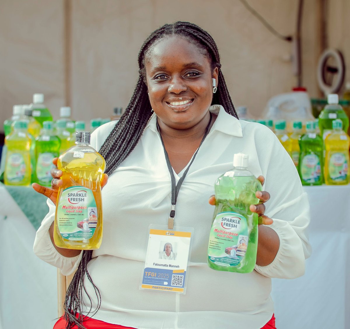 TheAlkambaTimes's tweet photo. Made in Gambia: Meet Young Gambian Entrepreneur Fatoumatta Manneh behind homemade liquid soap! 

A new star is rising in The Gambia’s entrepreneurial scene, and her name is Fatoumatta Manneh. The founder of Sparkle Fresh, a vibrant liquid soap business, is making waves at the GCCI Trade Fair, showcasing her products for the first time at Stall 54.

Launched in November 2024, Sparkle Fresh was born from Fatoumatta’s passion for hygiene and her dream of self-employment. After completing an online masterclass, she transformed her vision into reality, creating a line of liquid soaps that promise cleanliness with a touch of Gambian pride. “Starting this business was about more than soap—it was about building something meaningful for myself and my community,” she shared.

At the trade fair, Fatoumatta’s enthusiasm is infectious. “This experience is exciting and encouraging,” she said, her eyes sparkling with ambition. Brimming with colorful bottles of Sparkle Fresh, her stall has drawn curious visitors eager to support a homegrown brand. For Fatoumatta, this is just the beginning. She dreams of expanding her business and bringing her soaps to households across The Gambia and beyond.

The GCCI Trade Fair offers a golden opportunity to discover Sparkle Fresh and support a local entrepreneur with big dreams. Head to Stall 54 to meet Fatoumatta, try her products, and be part of her inspiring journey. In a world where small businesses fuel big change, Sparkle Fresh is a shining example of passion and purpose.