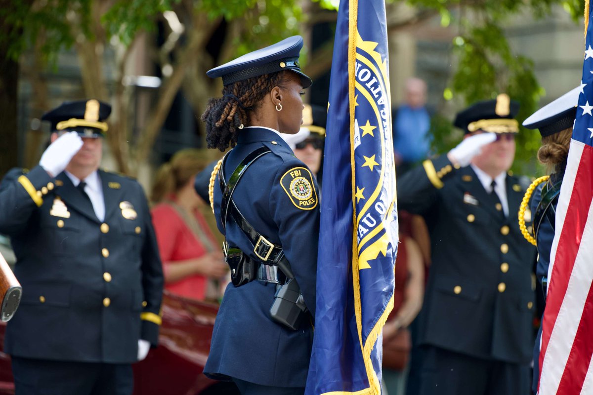 FBI's tweet photo. During National Police Week, the #FBI paused to honor its law enforcement partners and remember two of its own who made the ultimate sacrifice. https://t.co/Rum0ZqHVZi https://t.co/vkzoI54jXj