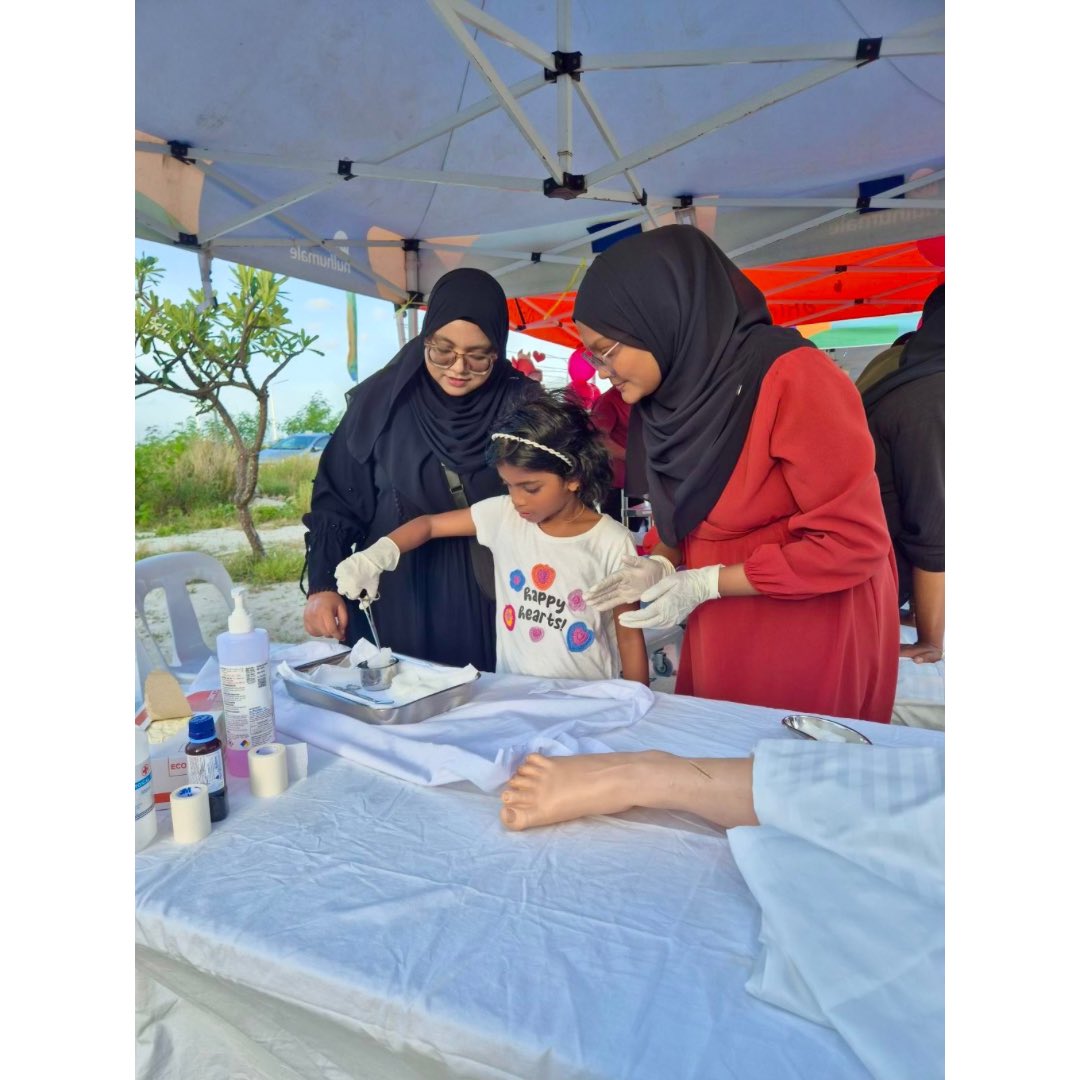 SN_MNU's tweet photo. Happening Now at the HDC Health Camp!
Alongside our heart health stall, our nursing students are also educating the public on essential nursing skills — including nasogastric tube feeding and wound dressing techniques.

@MNUSU @MNUedu https://t.co/g97IaC7jJ4